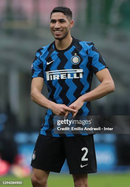 Achraf Hakimi of FC Internazionale celebrates his goal during the Serie A match between FC Internazionale and FC Crotone at Stadio Giuseppe Meazza on...