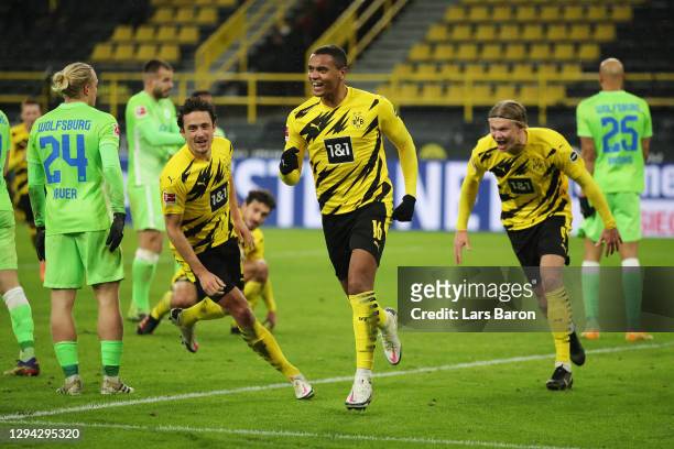 Manuel Akanji of Borussia Dortmund celebrates after scoring their sides first goal during the Bundesliga match between Borussia Dortmund and VfL...