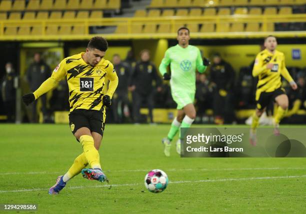 Jadon Sancho of Borussia Dortmund scores their sides second goal during the Bundesliga match between Borussia Dortmund and VfL Wolfsburg at Signal...