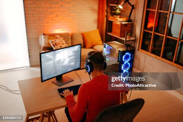 boy playing online games - computer gaming stock pictures, royalty-free photos & images