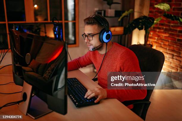 boy playing online games - gaming championship stock pictures, royalty-free photos & images