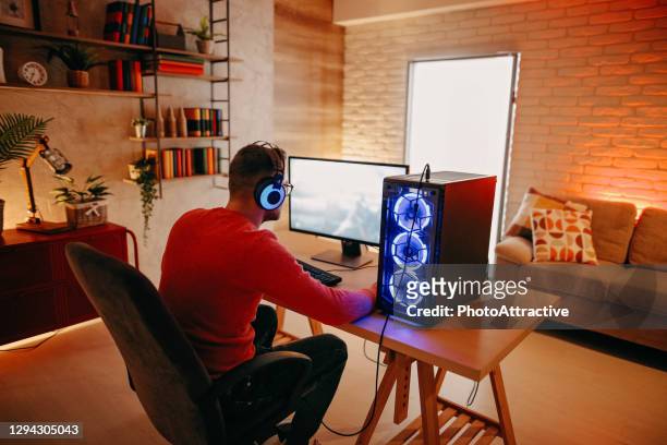 teenager playing games - desktop pc stock pictures, royalty-free photos & images