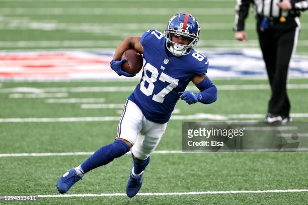 Sterling Shepard of the New York Giants scores on a 23-yard rushing touchdown against the Dallas Cowboys during the first quarter at MetLife Stadium...