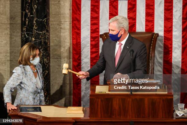 House Minority Leader Kevin McCarthy gavels in Speaker of the House Nancy Pelosi in at the US Capitol on January 03, 2021 in Washington, DC. Both...