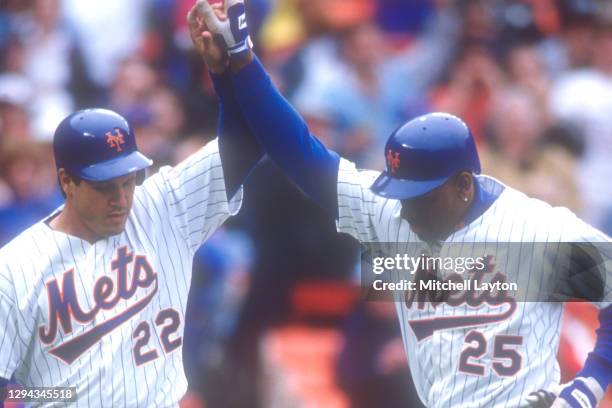 Bobby Bonilla of the New York Mets celebrates a homer with Kevin McReynolds"t during a baseball game against the San Francisco Giants on July 6, 1994...