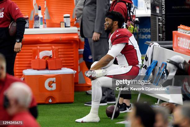 Kyler Murray of the Arizona Cardinals sits on the bench during the second half against the Los Angeles Rams at SoFi Stadium on January 03, 2021 in...