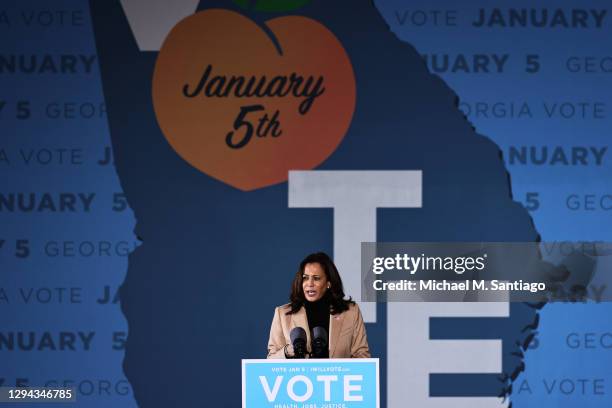 Vice President-elect Kamala Harris speaks during a drive-in rally at Garden City Stadium on January 03, 2021 in Savannah, Georgia. Vice...