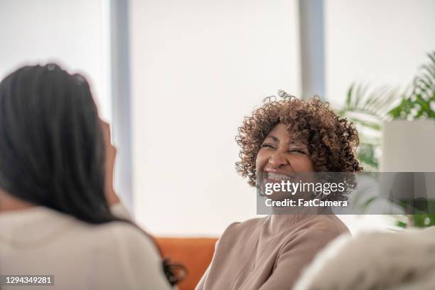 happy and smiling black senior woman - showus family stock pictures, royalty-free photos & images