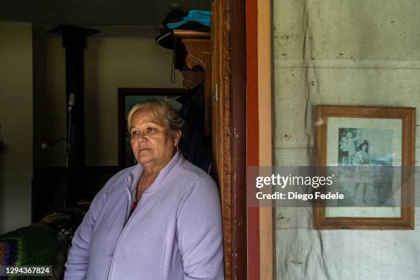 Resident Sherylle Holster poses for a photo on December 31, 2020 in Cann River, Australia. New Year's Eve marks one year since bushfires swept...