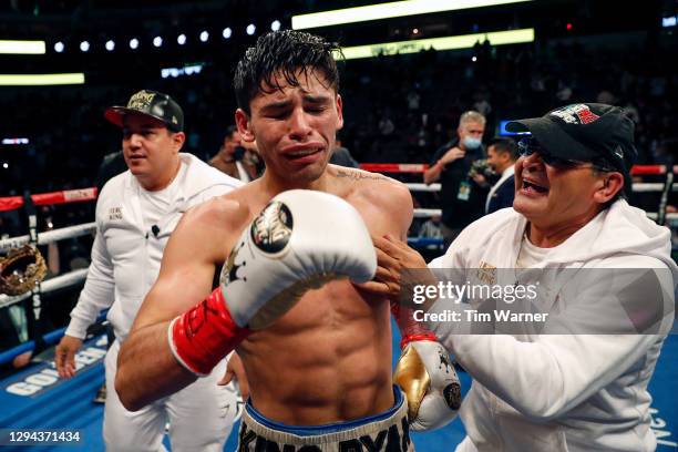 Ryan Garcia reacts after knocking out Luke Campbell during the WBC Interim Lightweight Title fight at American Airlines Center on January 02, 2021 in...