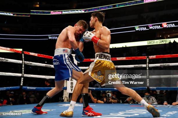 Ryan Garcia throws a right hook against Luke Campbell during the WBC Interim Lightweight Title fight at American Airlines Center on January 02, 2021...