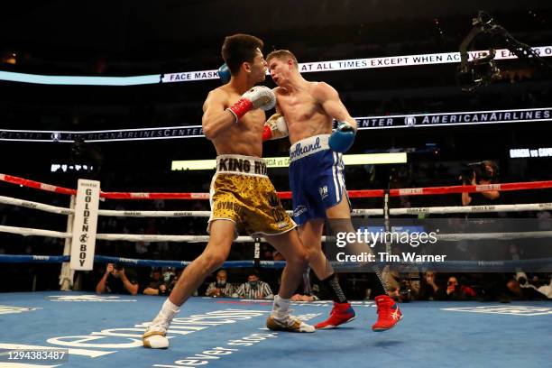 Ryan Garcia lands a left to the body of Luke Campbell during the WBC Interim Lightweight Title fight at American Airlines Center on January 02, 2021...