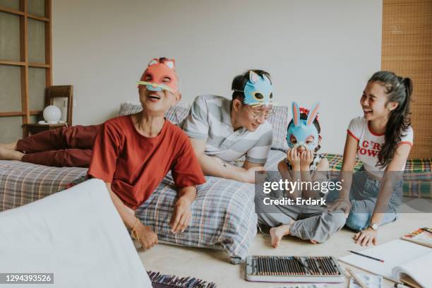 wearing animal mask for playing game with cute girl-stock photo - acting stock pictures, royalty-free photos & images