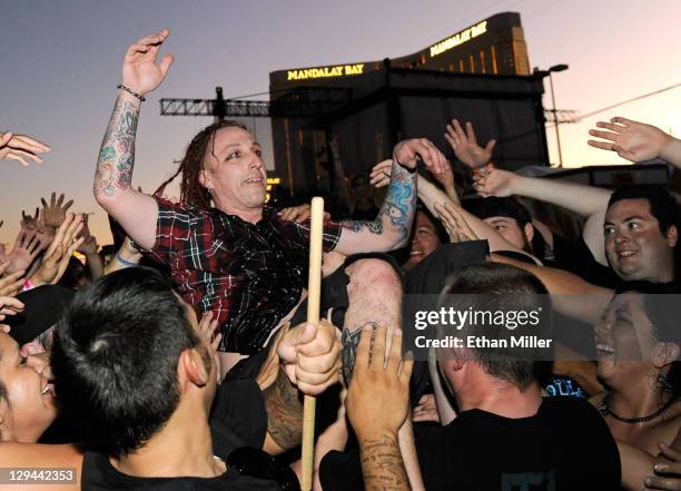 Sevendust drummer Morgan Rose surfs the crowd during the 48 Hours Festival October 16, 2011 in Las Vegas, Nevada.