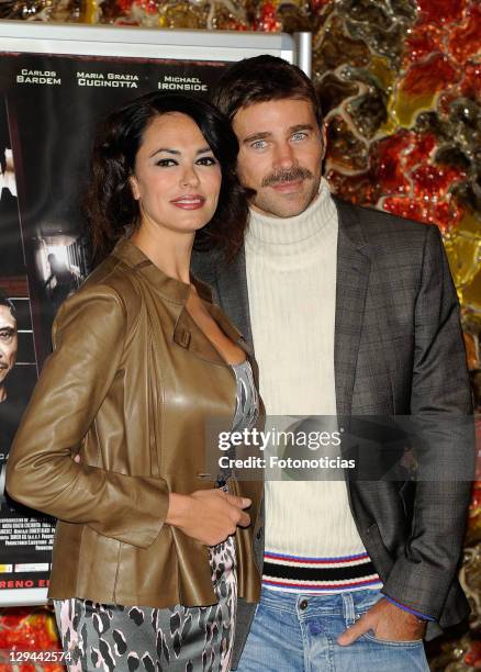 Actress Maria Grazia Cucinotta and actor Fabio Fulco attend a photocall for 'Transgression' at Palafox Cinema on October 17, 2011 in Madrid, Spain.