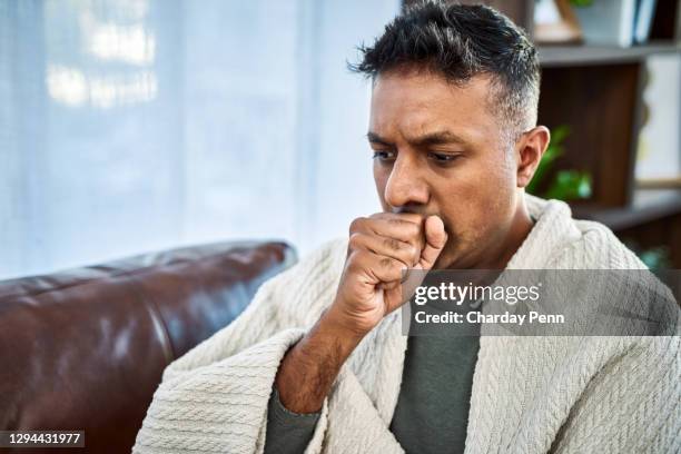 what kind of cough is this? - covid 19 symptoms stock pictures, royalty-free photos & images