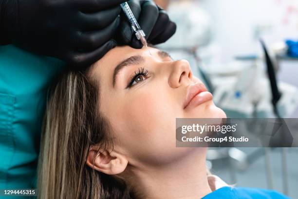 facial aesthetics surgery treatment - beauty shot of young woman stock pictures, royalty-free photos & images