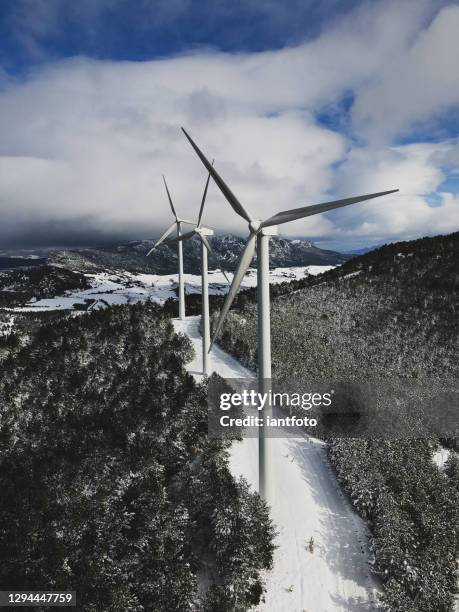 snowy wind farm in winter. - navarra stock pictures, royalty-free photos & images