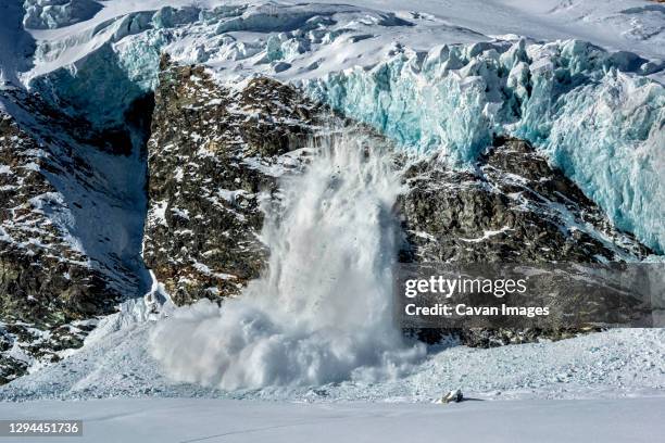 avalanche in allalin glacier switzerland - lawine stock-fotos und bilder