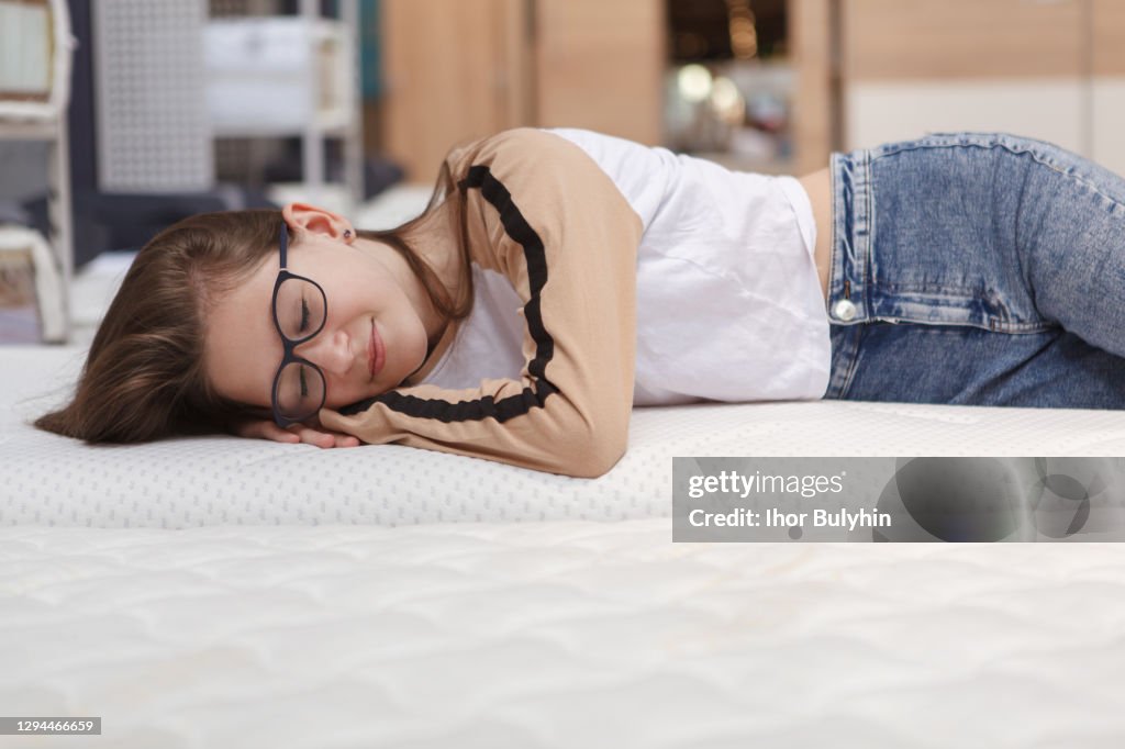 Teen girl shopping at furnishings store