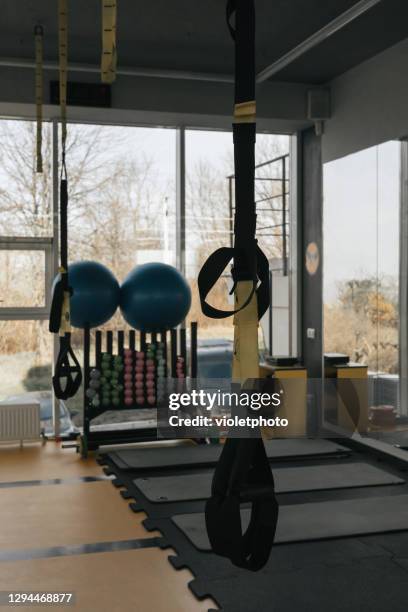 modern and big gym with sports equipment - shoulder press gym stock pictures, royalty-free photos & images