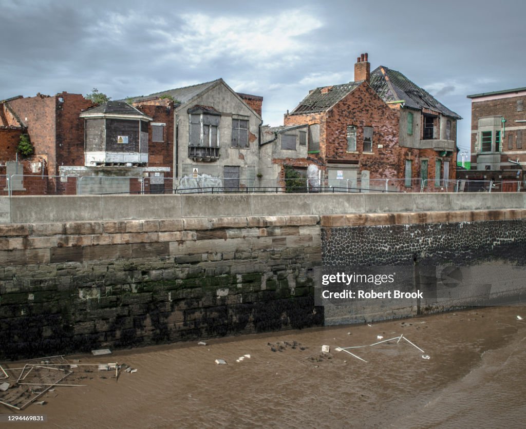 Derelict buildings along waterfront