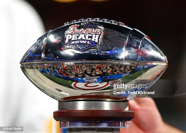 The Peach Bowl trophy on the stand after the Chick-fil-A Peach Bowl against the Cincinnati Bearcats at Mercedes-Benz Stadium on January 1, 2021 in...