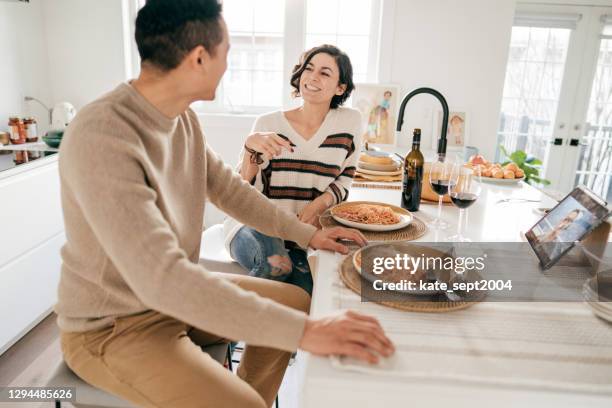 drinking to healthy relationships; a unique pairings philosophy - kitchen island stock pictures, royalty-free photos & images