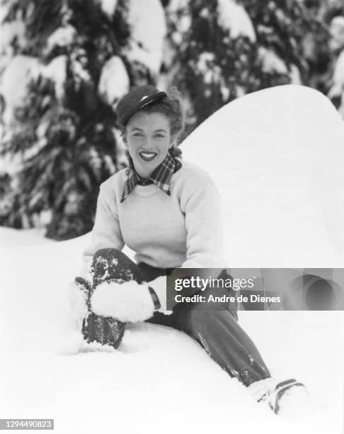 Portrait of American actress and model Marilyn Monroe as she poses, in the snow, at Mount Hood, Oregon, 1945.