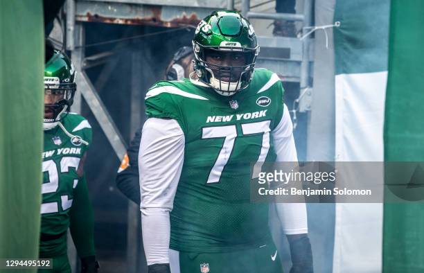 Mekhi Becton of the New York Jets before entering the field ahead of a game against the Cleveland Browns at MetLife Stadium on December 27, 2020 in...