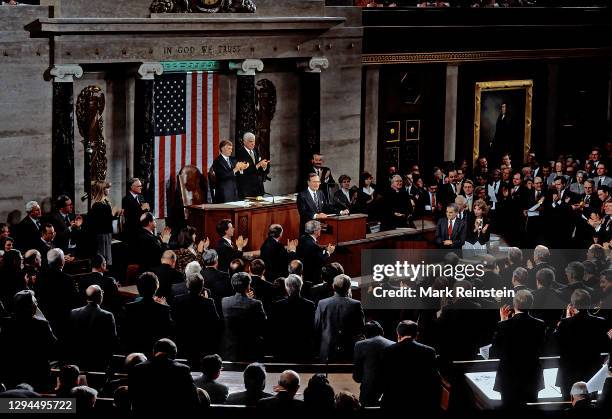 President George H.W. Bush delivers his Address Before a Joint Session of the Congress on the Cessation of the Persian Gulf Conflict, to a standing...