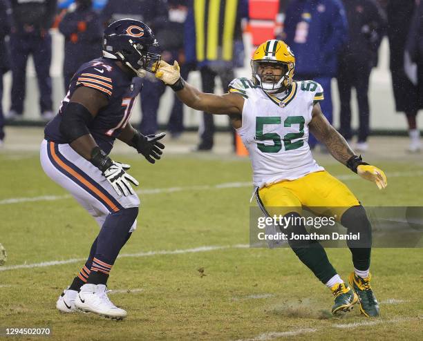 Rashan Gary of the Green Bay Packers rushes against Germain Ifedi of the Chicago Bears at Soldier Field on January 03, 2021 in Chicago, Illinois. The...