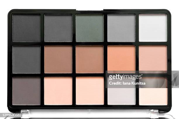 beautiful palette of multi-colored beige and gray eyeshadows on white background. isolated. decorative cosmetics. beauty products. tool for makeup artist. pastel trendy colors. brown eye shadow. - farbpalette stock-fotos und bilder