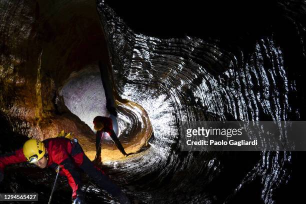 vorgozzino cave - caving stock pictures, royalty-free photos & images
