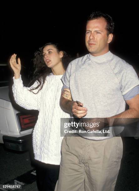 Actress Demi Moore and actor Bruce Willis attend the "And God Created Woman" Century City Premiere on March 1, 1988 at 20th Century Fox Studios in...