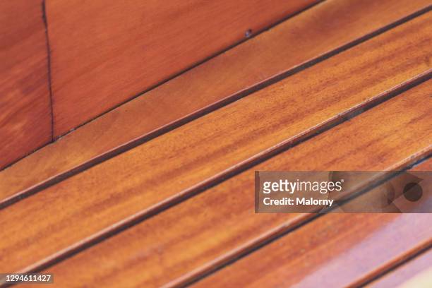close-up of the deck of a sailboat. sailing - timber deck stock-fotos und bilder
