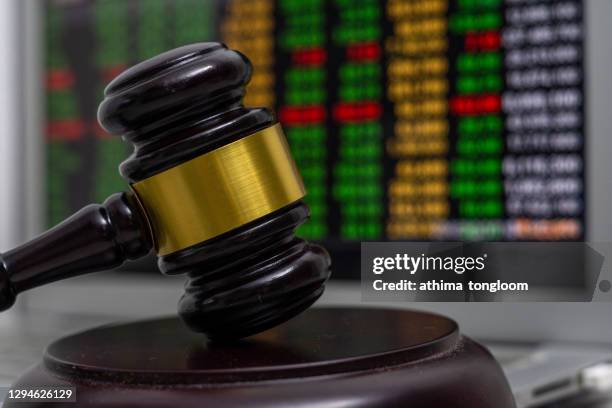 business chart with judges court gavel - online auction stock pictures, royalty-free photos & images