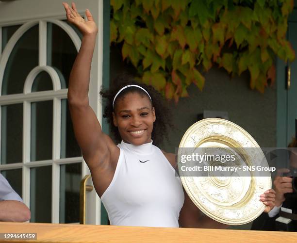 Serena WILLIAMS v Angelique KERBER .WIMBLEDON - LONDON .Serena Williams lifts her Wimbledon title having won in straight sets