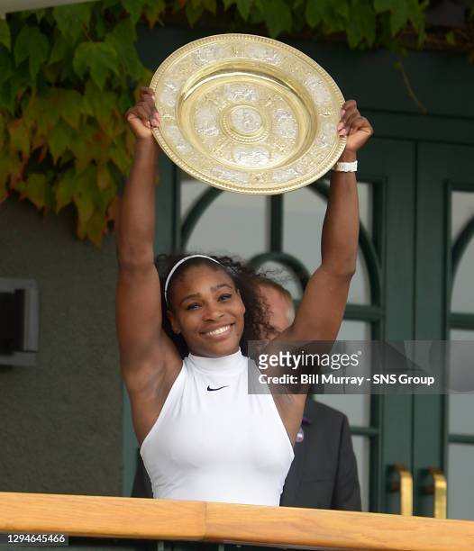 Serena WILLIAMS v Angelique KERBER .WIMBLEDON - LONDON .Serena Williams lifts her Wimbledon title having won in straight sets