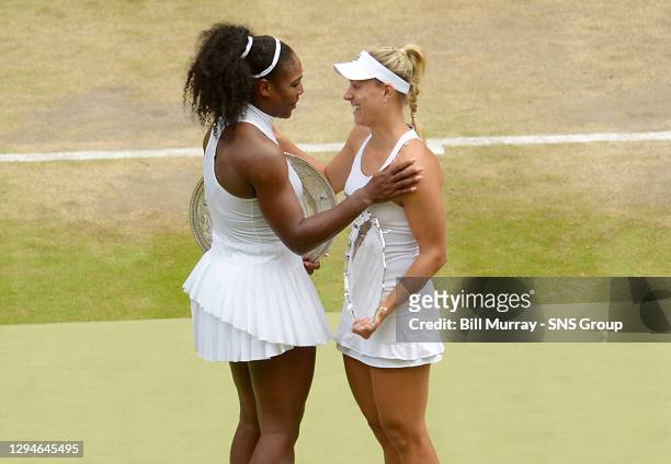 Serena WILLIAMS v Angelique KERBER .WIMBLEDON - LONDON .Serena Williams with Angelique Kerber