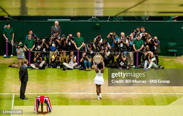 Serena WILLIAMS v Angelique KERBER .WIMBLEDON - LONDON .Serena Williams lifts her Wimbledon title having won in straight sets