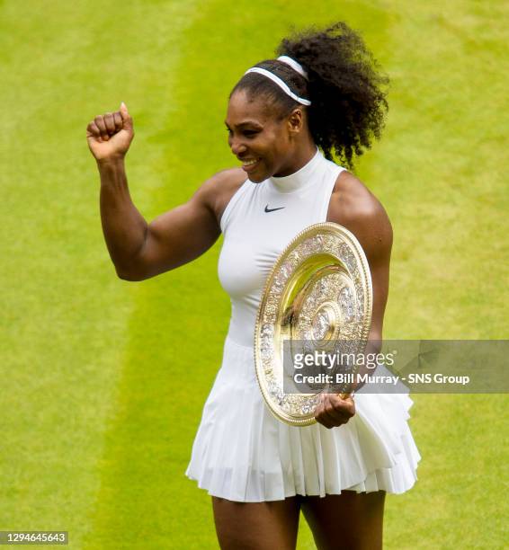 Serena WILLIAMS v Angelique KERBER .WIMBLEDON - LONDON .Serena Williams lifts her Wimbledon title having won in straight sets