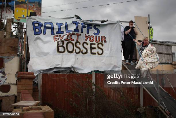 Resident crosses the main barricade at Dale Farm camp on October 17, 2011 near Basildon, England. Residents of the camp have lost their final legal...