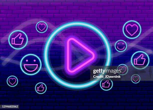 stockillustraties, clipart, cartoons en iconen met live streaming event neon sociale media banner ontwerp met play knop en interactieve pictogrammen op paarse bakstenen muur - live evenement