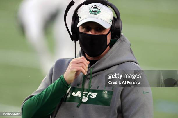 Head Coach Adam Gase of the New York Jets follows the action against the New England Patriots at Gillette Stadium on January 3, 2021 in Foxborough,...