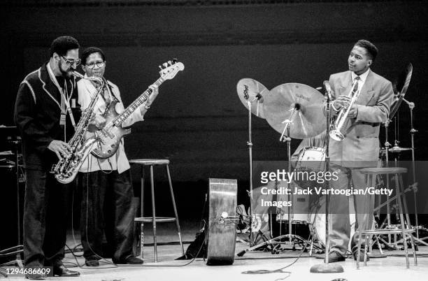 American Jazz musician Sonny Rollins plays tenor saxophone as he performs with his group at Carnegie Hall, New York, New York, April 13, 1991....