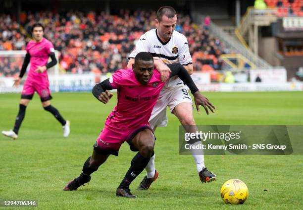 V DUMBARTON.TANNADICE PARK - DUNDEE .Dundee Unitedâ€™s Tope Obadeyi and Dumbartonâ€™s Garry Fleming.