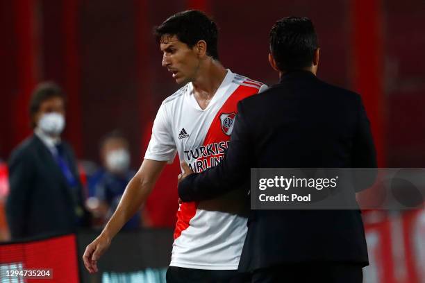 Marcelo Gallardo coach of River Plate hugs Ignacio Fernández of River Plate after leaving the pitch replaced during a first leg semifinal match...