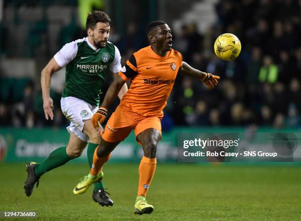 V DUNDEE UNITED.EASTER ROAD - EDINBURGH .Hibernian's Lewis Stevenson in action with Dundee United's Tope Obadeyi