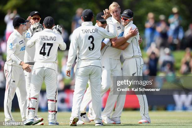 Kyle Jamieson of New Zealand is congratulated by team mates after dismissing Faheem Ashraf of Pakistan during day four of the Second Test match in...